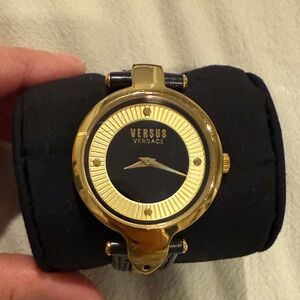 Versus Versace Black and Gold Timepiece watch‎